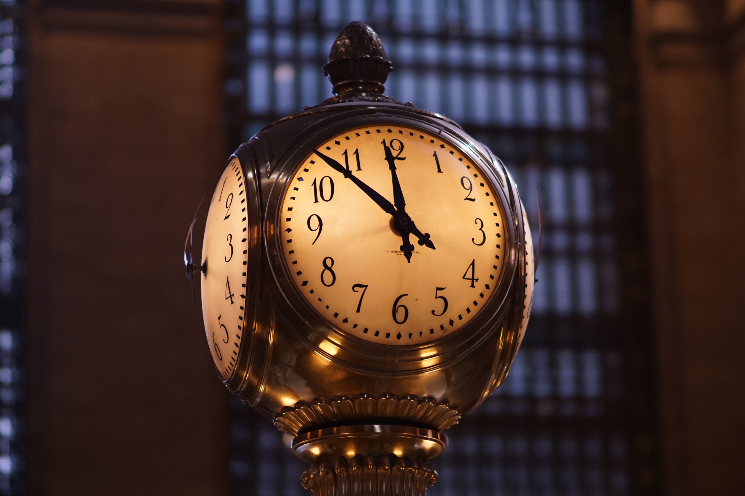 bryce-barker-73651-unsplash brass clock