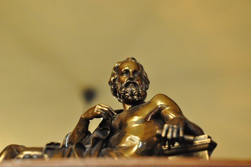 a bronze statue of Plato