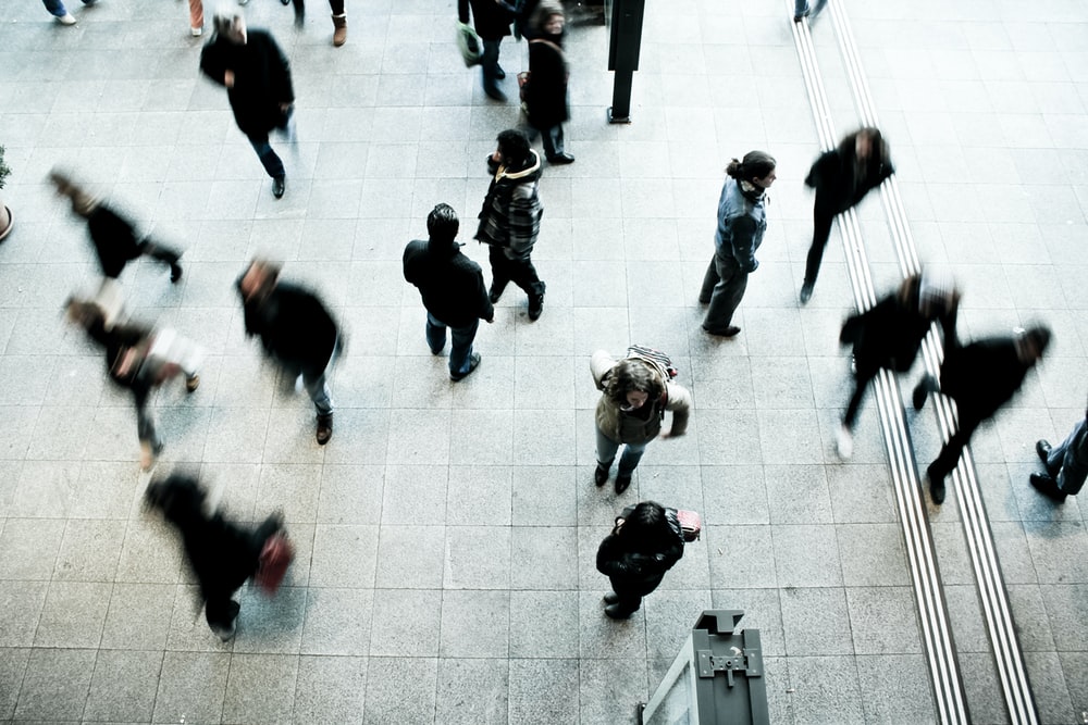 people at a train station