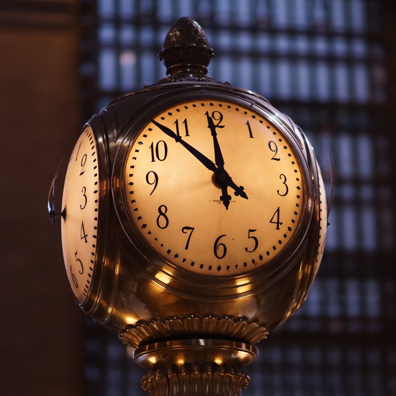 bryce-barker-73651-unsplash brass clock